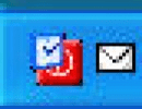 In System Tray (Left Most Icon)